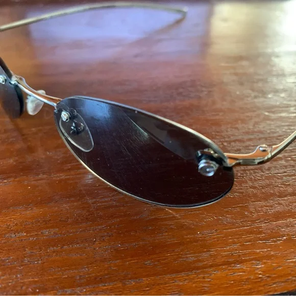 Gucci Silver Rimless Sunglasses - Picture 2 of 12
